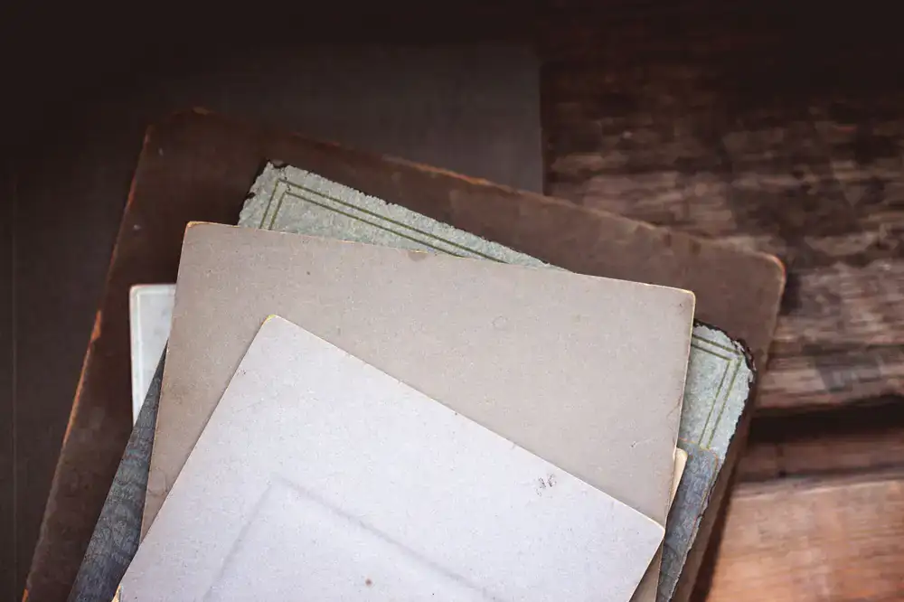 Stack of archival paper and minimal framing examples